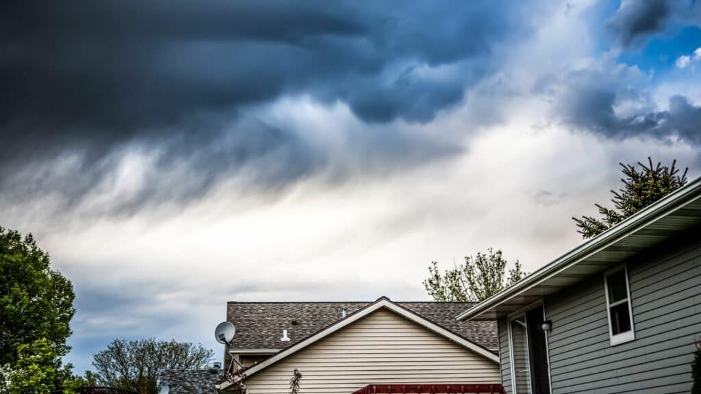 homes with new siding showing protection from incoming storms